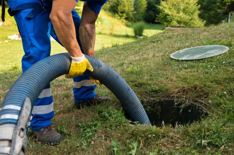 septic tank being drained-min